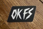  OK FS KOUINIA DUSTY  sticker on a table
