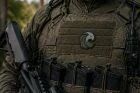 Cracked patch on tactical vest