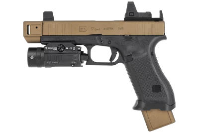 Glock personalizada con ca��n de bronce a la izquierda